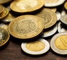 Monedas  nacionales de México de diferentes valores principalmente de 10 pesos.