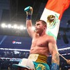 Canelo Álvarez en los hombros de Eddy Reynoso.