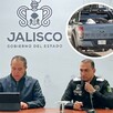 Autoridades en materia de seguridad de Jalisco sentados detrás de una mesa con micrófonos ante los medios de comunicación