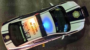 Patrullas capitalinas acordonando la zona donde una adulta mayor murió atropellada en la Gustavo A. Madero.