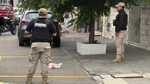 policías resguardan una calle donde fue abandonado un feto en boca del río veracruz