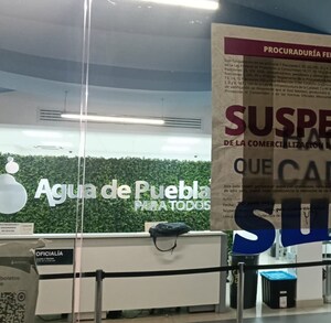 sello de suspensión de actividades de profeco en una sucursal de agua de puebla