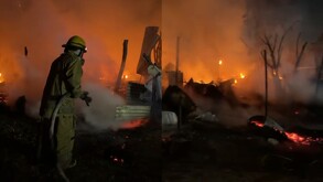 Bomberos combatiendo incendio en Juárez.