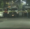 Policías acordonando el lugar donde mataron a dos personas en la colonia Doctores.
