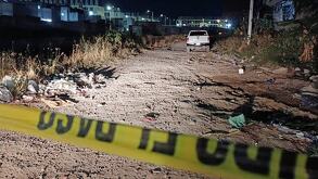 Vecinos localizaron un cuerpo baleado y calcinado en Lomas del Mirador, Tlajomulco.