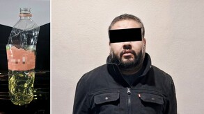 Detenido por intentar quemar a su pareja usando una botella de gasolina.