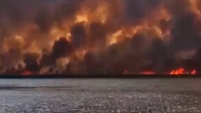 INCENDIO LAGUNA ZAPOTLANEJO CON IMAGEN CON MUCHO HUMO