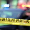 Linea de policía resguarda la zona de un asesinato en Puebla.