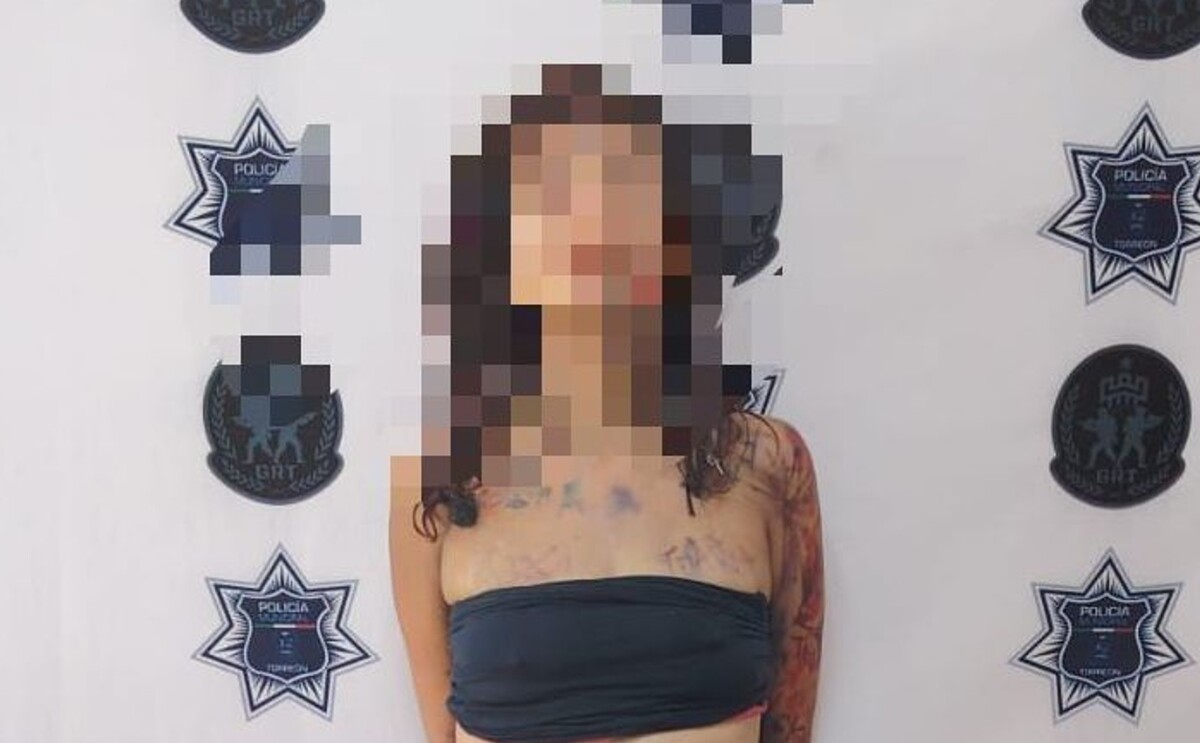 Mujer herida y detenida.