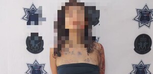 Mujer herida y detenida.