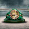 Cinturón verde y oro del Consejo Mundial de Boxeo.