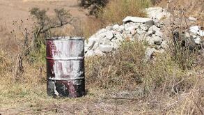 Contenedor abandonado en un terreno baldío de Cuautlancingo en Puebla.