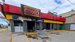 Oxxo incendiado en Los Reyes La Paz