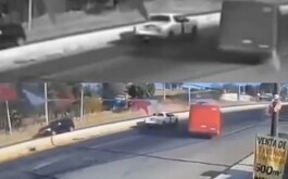 Camión de transporte público y camioneta particular