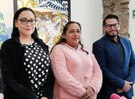 tres mujeres y un hombre durante una conferencia de prensa sobre la marcha del 8 de marzo en puebla