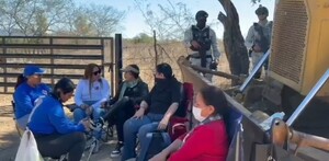 Familiares de mineros identificados tras hallazgo de fosas en Concordia.