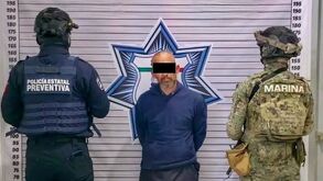 Fotografía del momento en el que recapturaron al preso que se fugó en febrero del penal de San Pedro Cholula.