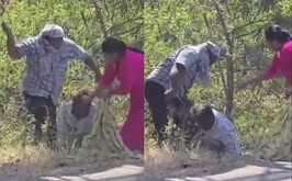 Pareja asesinando a un hombre a la orilla de una carretera de la India.