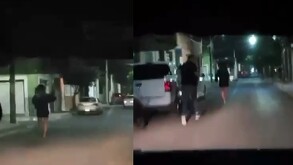 Mujer trans corriendo con vestido en color negro