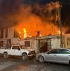 Un incendio consumió una vivienda en la colonia Zaragoza; el fuego habría iniciado por un cortocircuito. Dos cachorros fueron rescatados.