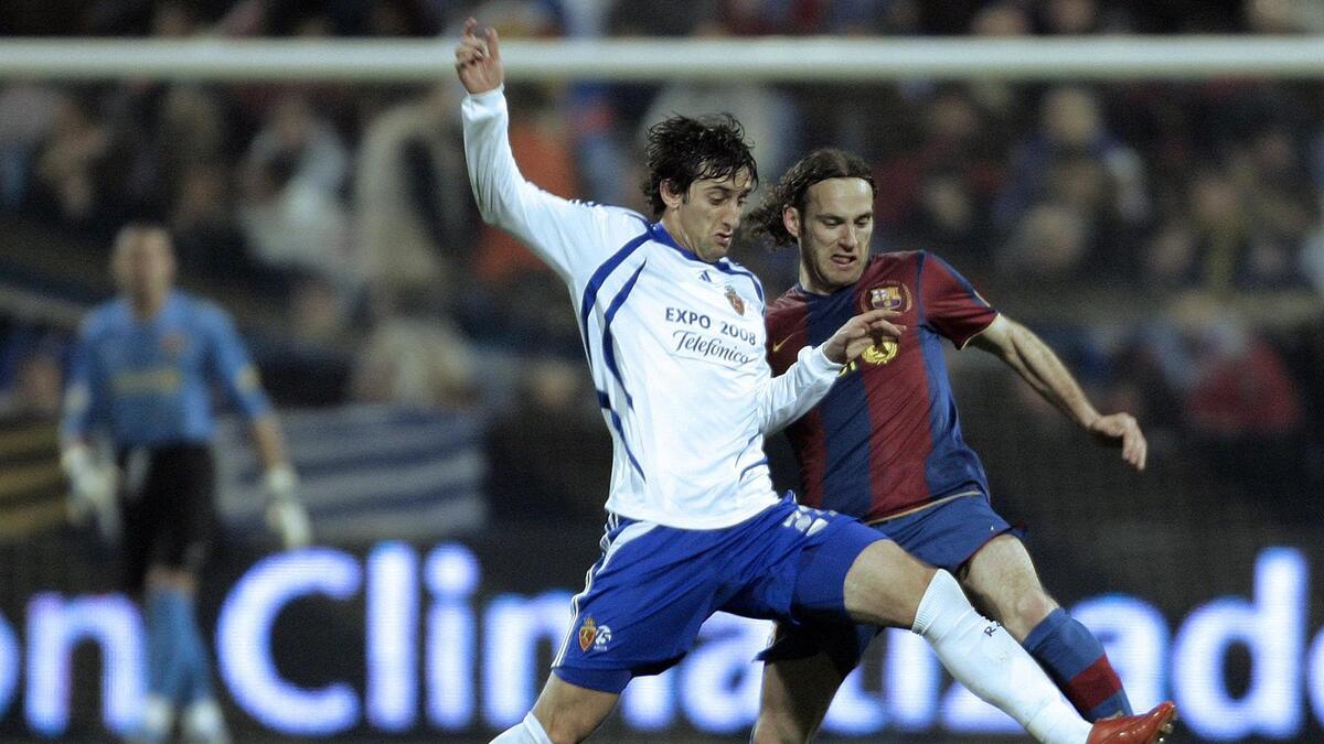 Diego Milito en Zaragoza y Gabriel Milito en Barceliona, en un duelo por el balon