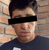 Se observa a dos hombres con cintillo negro en ojos, visten playeras.