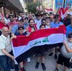 Seguidores iraquíes invaden el centro de Monterrey con cánticos y banderas; aseguran que 'la ciudad es bella' y se declaran fans de los tacos de trompo.