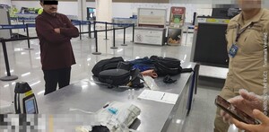 Hombre detenido en el AICM