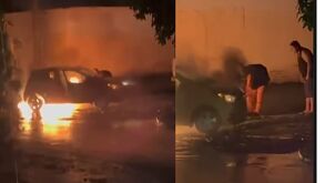 Hombre sacando de un incendio al taxista en Lerdo