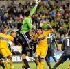 Jugadores en el partido de Tigres vs Seattle Sounders en la Liga de Campeones 2013.