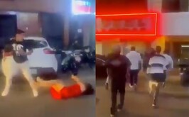 Hombre golpeando a su pareja a las afueras de una discoteca en Perú y hombres defendiéndola.