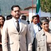 Pedro Valencia Cerecero, Secretario de Ocampo en Michoacán, durante un evento público con personas y banderas de México alrededor