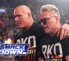 Randy Orton y Patt McAffe saliendo de WWE SmackDown.