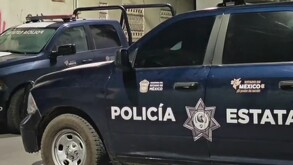 Patrullas acordonando la zona donde murió un policía en Tenango del Valle, Estado de México.