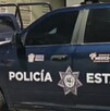 Patrullas acordonando la zona donde murió un policía en Tenango del Valle, Estado de México.