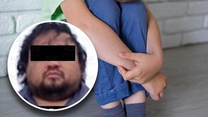 Rostro de un hombre gordo con barba junto a un niño llorando.
