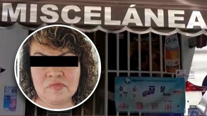 Fachada de una tienda junto con la imagen de una mujer.