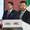 José Luis García Parra y alejandro armenta en la presentación del cablebús en puebla