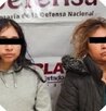 Aspecto de una vivienda modesta y los rostros de dos mujeres detenidas en Puebla.