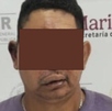 Hombre con el rostro cubierto y la boca chueca presentado ante las autoridades de Veracruz.