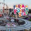 vista aérea de juegos mecánicos y personas en el recinto de la feria de puebla 2026