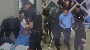 Policías Municipales junto a hombre con camisa en color azul