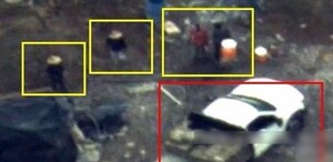 Toma aérea difentes personas en el sitio