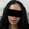 Ficha de imputación de la Fiscalía de Jalisco con un imagen de la expolicía Emma Yesenia Rubí N con los ojos censurados
