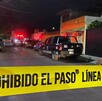 Área acordonada en escena del crimen.