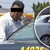 Hombre de camisa blanca azoma la cabeza a un auto blanco para agredir al conductor.