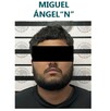 Ficha de vinculación a proceso de la Fiscalía de Jalisco con una imagen de Miguel Ángel 'N' con los ojos censurados por un recuadro negro