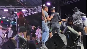 Varias personas en escenario peleando físicamente