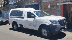 Carroza fúnebre estacionada afuera de una vivienda en Orizaba, Veracruz.