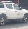 Camioneta blanca de la FGED Durango